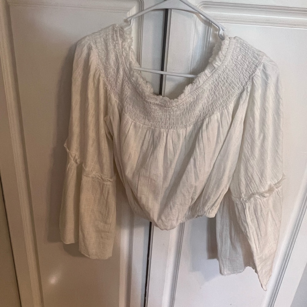 Boutique off the shoulder crop top with wide sleeves